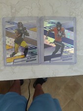 Lot Of 2 2025 Panini Revolution Blue Astro #'d /549 DK Metcalf & Deuce Vaughn