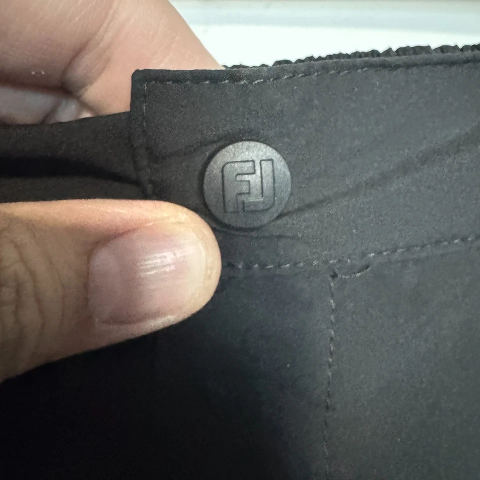 Pantalones de lluvia Footjoy Hydrolite para mujer medianos negros impermeables rendimiento golf Foto 4 de 4