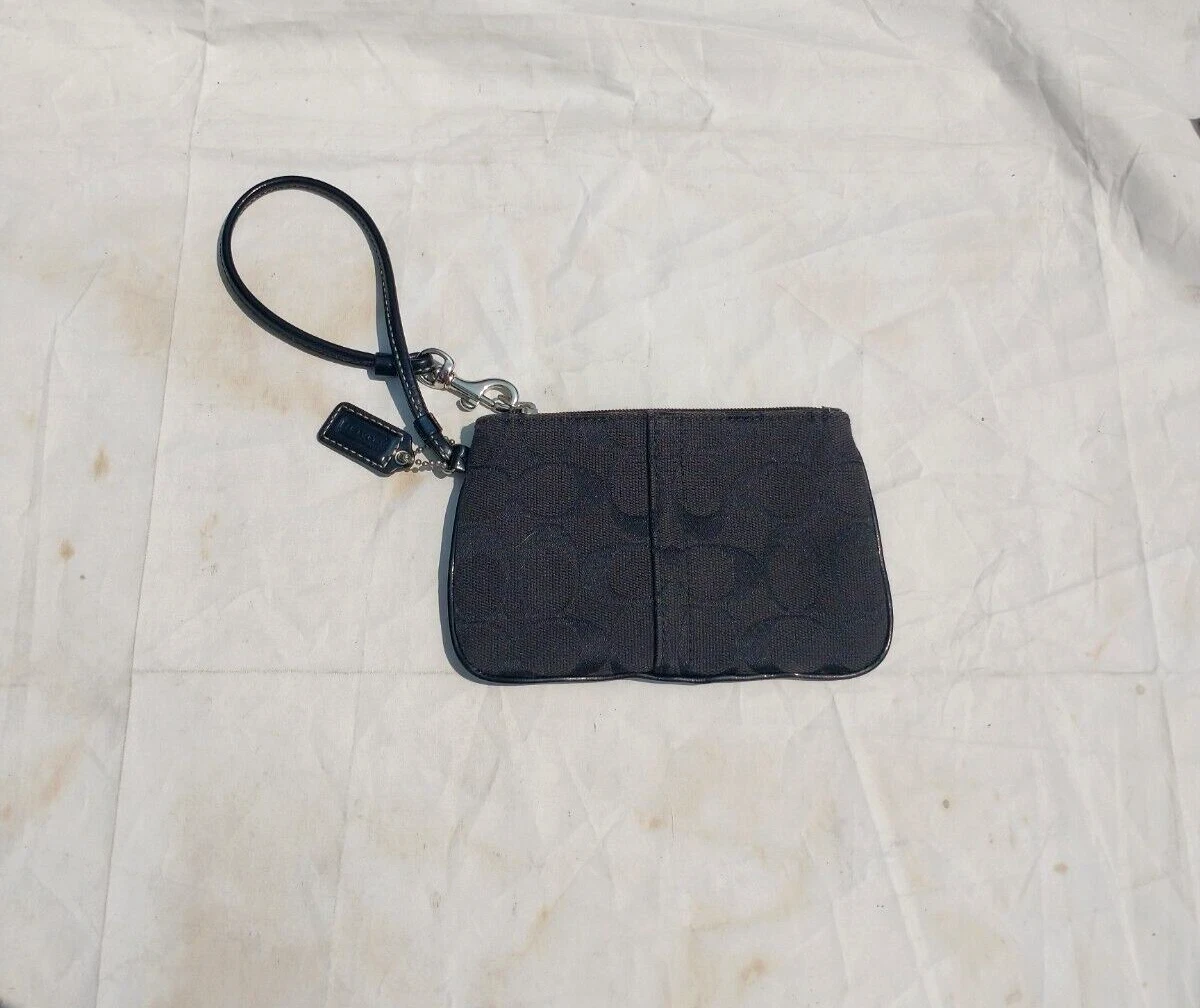 Portafoglio pochette Coach nero da polso design classico