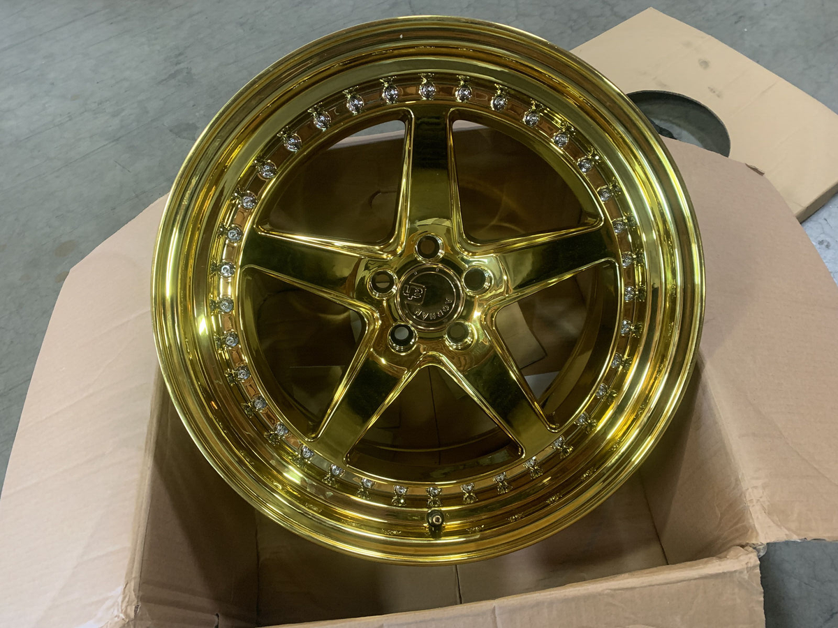 One 18x9.5 +35 Aodhan DS05 5x100 Gold Vacuum w/ Chrome Rivets