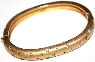 Lot#9 Beautiful SWAROVSKI signed goldtone hinged bracelet needs a few crystals