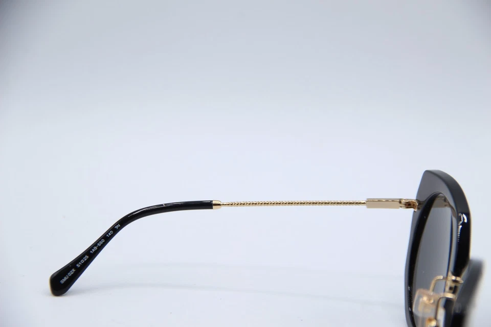 NUEVAS GAFAS DE SOL MIU MIU SMU 02X 1AB-5S0 NEGRAS DORADAS MARCOS AUTÉNTICOS 51-25 Foto 3 de 4