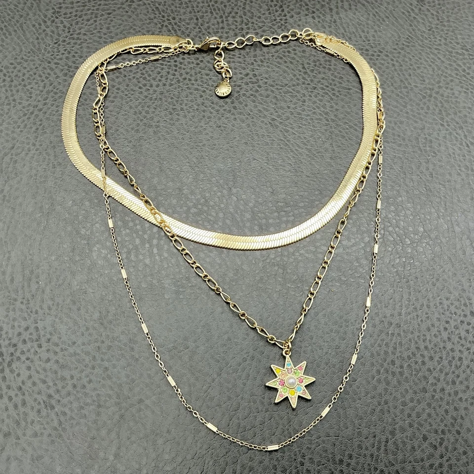 Collar BCBGeneration de 3 hilos en capas tono dorado Starburst dije perla cristal Foto 2 de 4