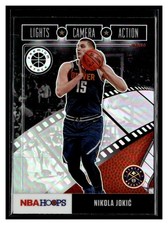 2019-20 Hoops Premium Stock #28 Nikola Jokic Lights Camera Action Holo Nuggets