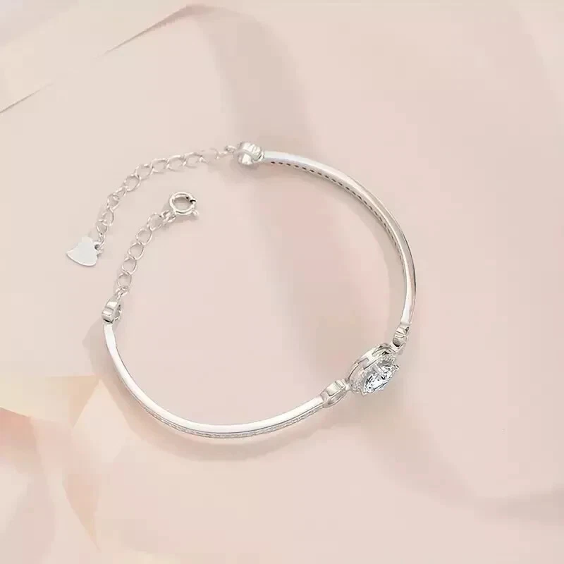 Brazalete brazalete para mujer de diamantes creados en laboratorio de corte redondo de 4 quilates acabado en oro blanco de 14 quilates Foto 3 de 3