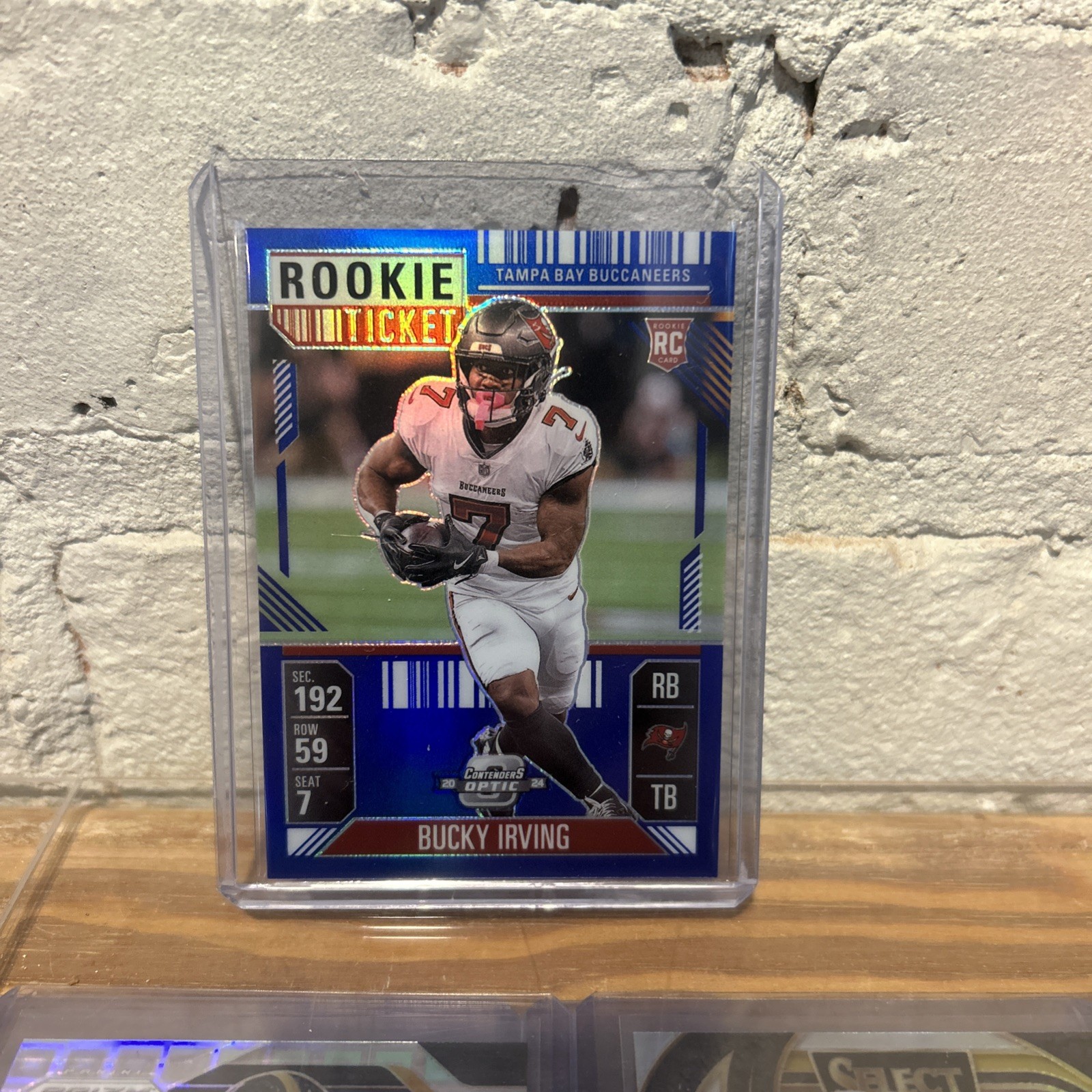 2024 Panini Contenders Optic - Rookie Bucky Irving #67 Blue Prizm /99 (RC)