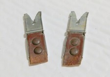 Two original Rolleiflex alligator clips, ready for "re-strapping"