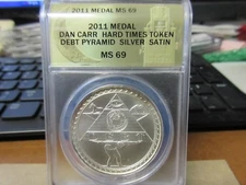 2011  Debt Pyramid Hard Times Token by Daniel Carr Silver Satin ANACS MS 69