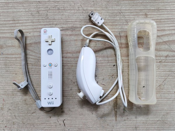 Mando Wii Mote + Nunchuk + Funda De Silicona Original