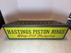 VINTAGE HASTINGS PISTON RINGS METAL SIGN BOOK CATALOG RACK DISPLAY ADVERTISING
