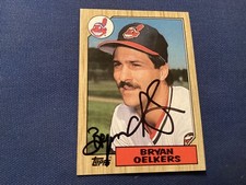 BRYAN OELKERS SIGNED 1987 TOPPS MINT CARD # 77, INDIANS PITCHER/ FREE POSTAGE!!!