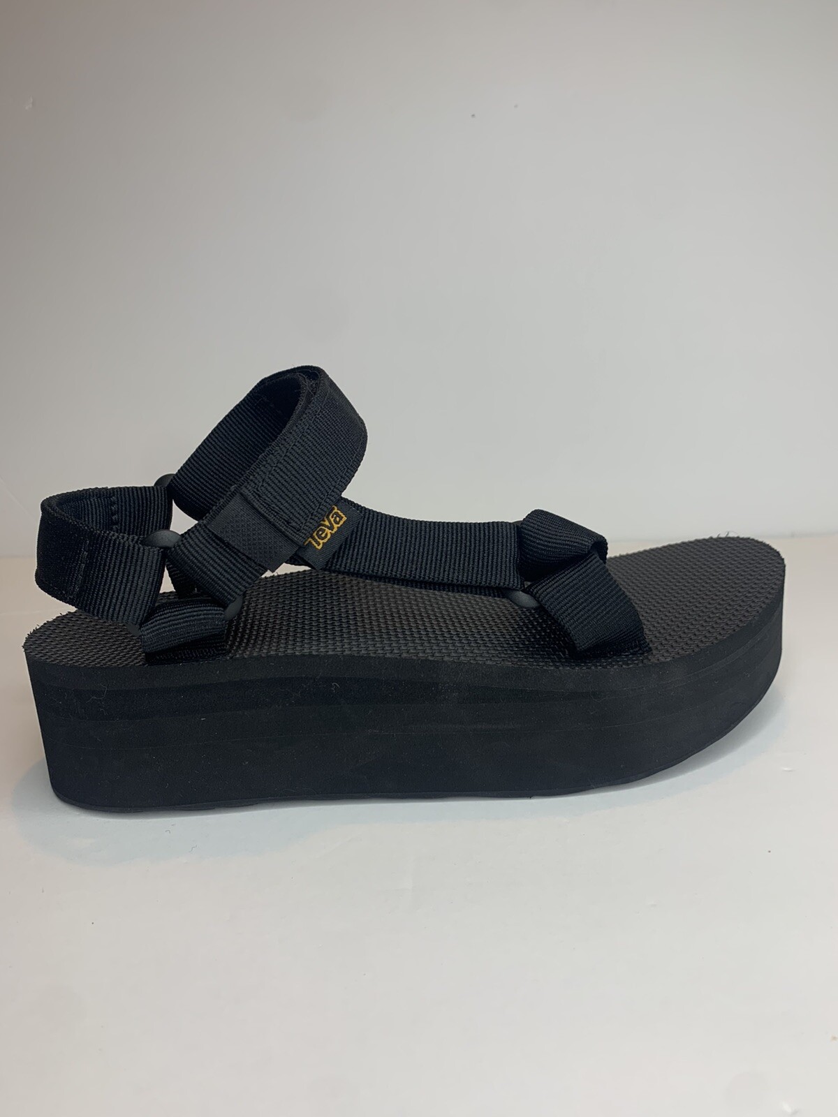 teva black platform sandals