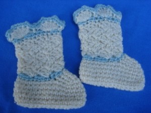 white knitted baby booties