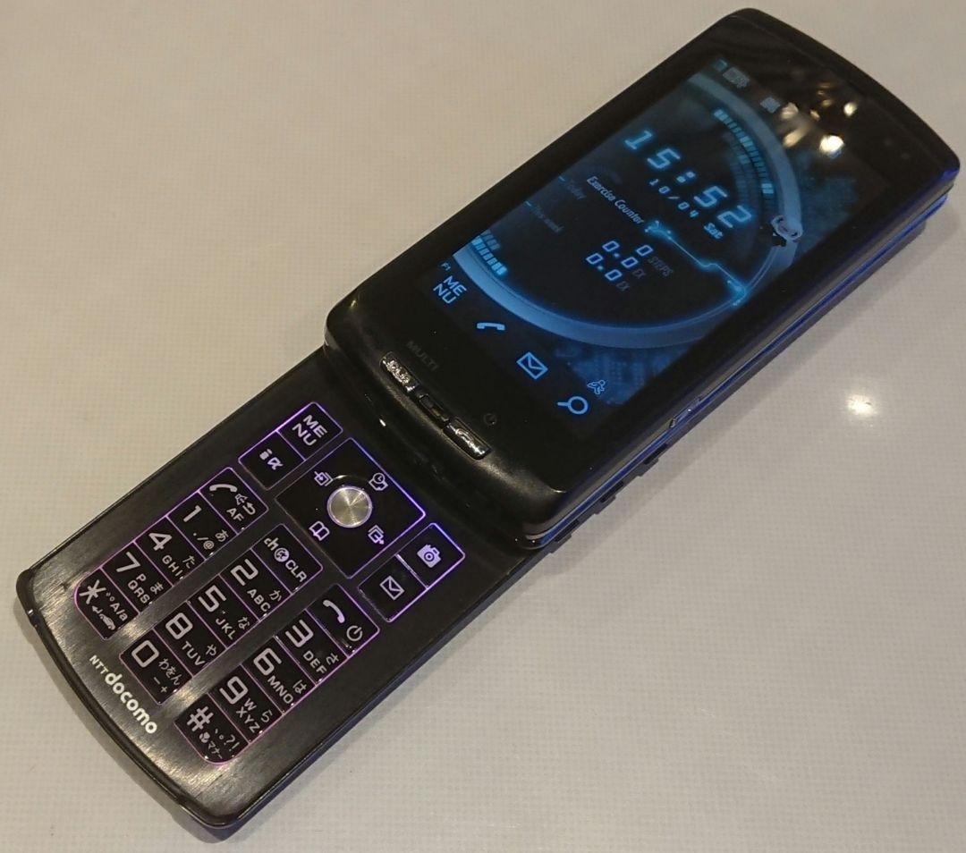 Docomo F-04B Black Fujitsu Split Keyboard Mobile Phone Rare Japan