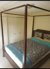 ethan allen canopy four post bedframe. Dark mahogany wood 