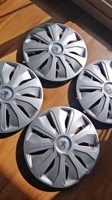 LOT DE 4 ENJOLIVEURS 207 / 206+ / 107 pour JANTES 14" - Photo 1/3