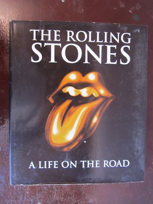 The Rolling Stones : A Life on the Road by Rolling Stone Press Staff, Jools Holl