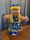 2000s Cabbage Patch Kid Blonde Hair Hazel Eyes Yellow And Blue Floral Dress