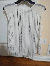  Apt New white and black woman blouse. Never been used. Size M