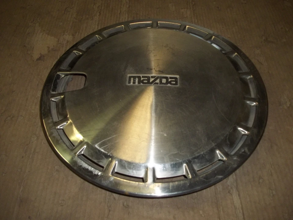 83 84 85 86 Mazda GLC 1983 tapacubos llanta tapacubos 13" fabricante de equipos originales usado 56507 Foto 2 de 4