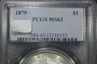 TWO 1879 PCGS MS63 MORGAN SILVER DOLLARS. TWO COINS IN THIS LOT