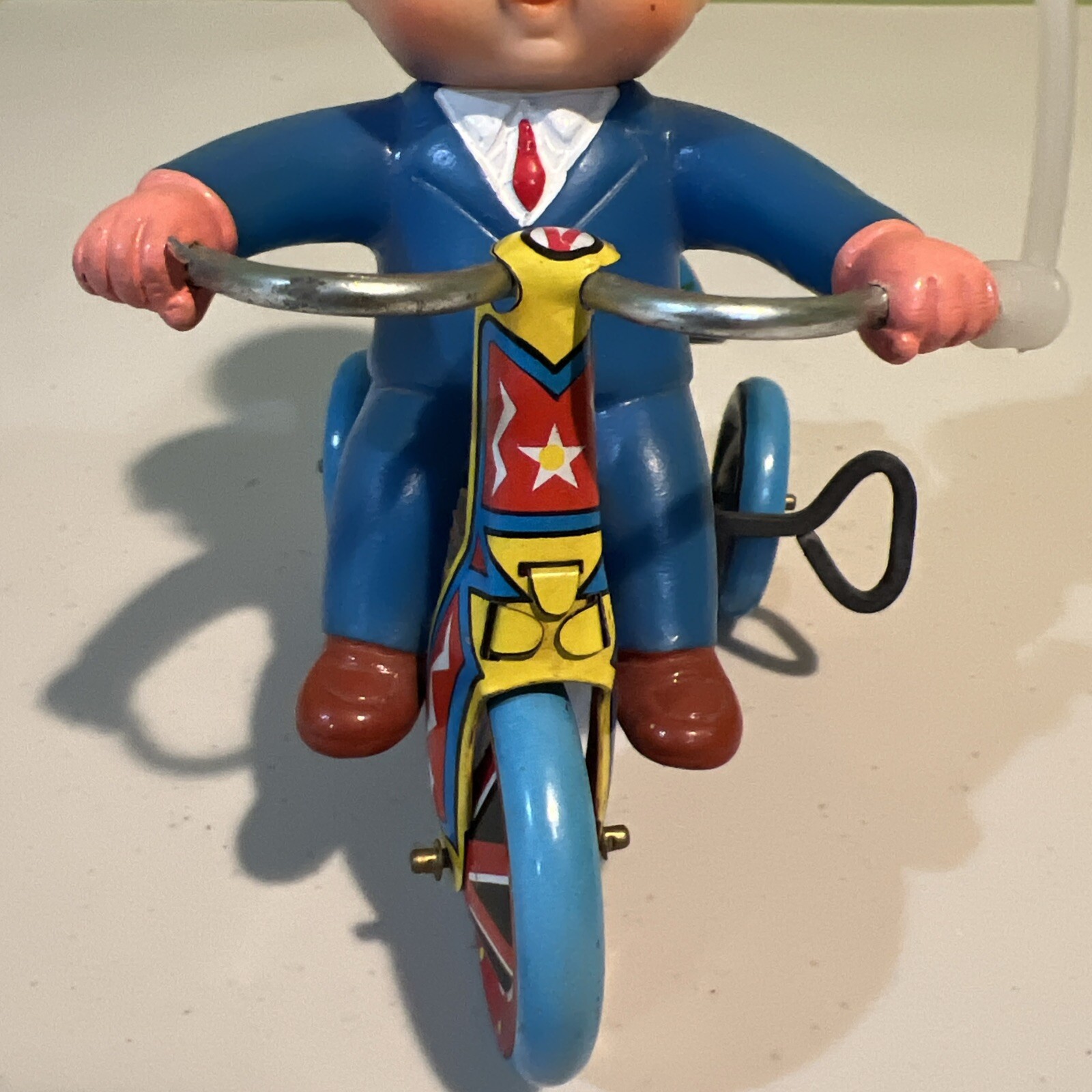 TIN LITHO WIND UP TOY- BOY RIDING TRICYCLE - WORKING - NICE