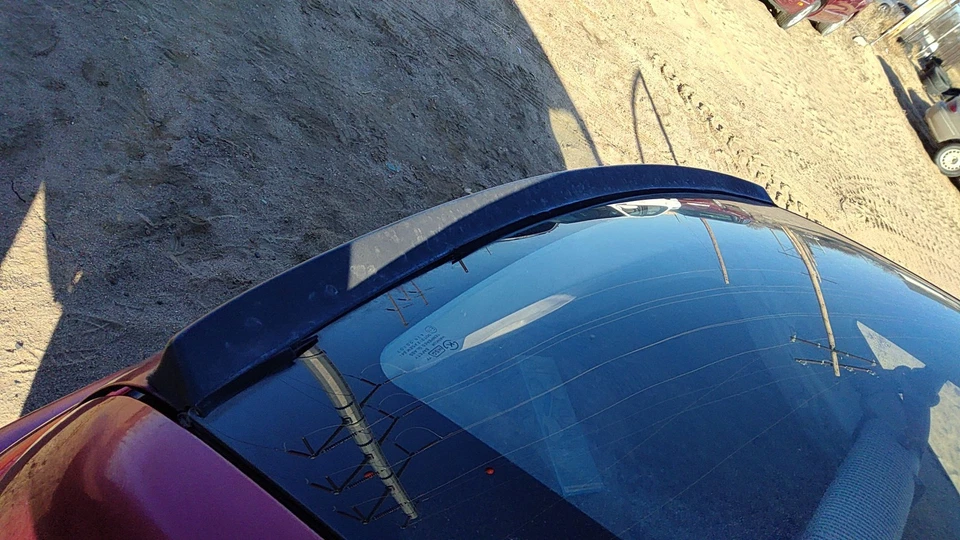 Alerón trasero Ford Aspire 1994-1997 OEM F4BZ6144210C Foto 3 de 4