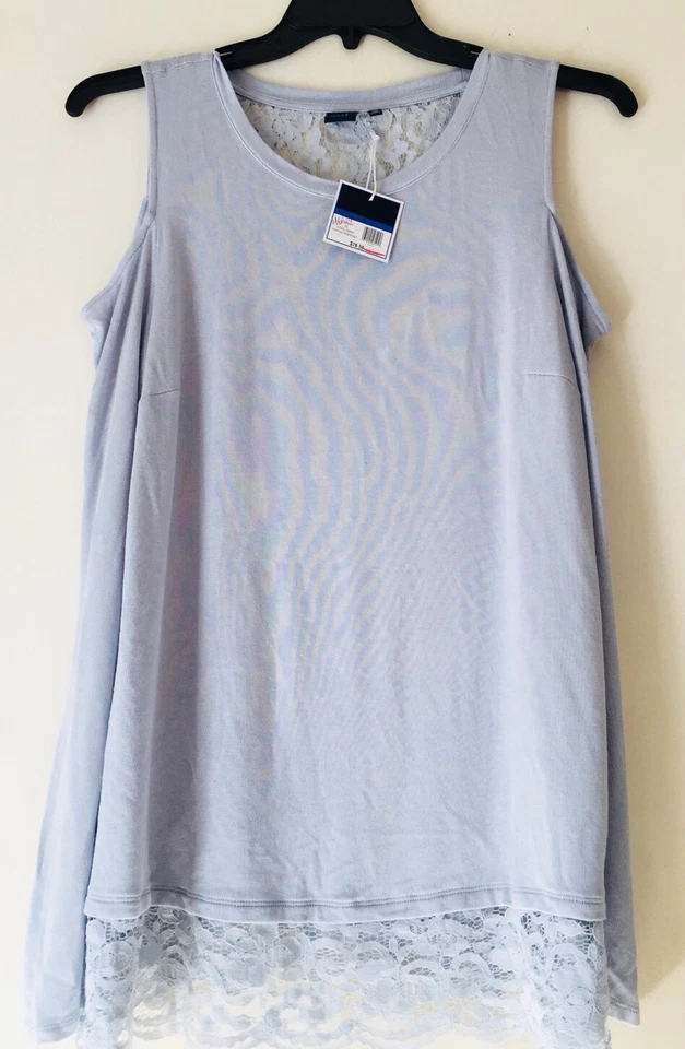 Top ribete encaje hombro frío azul Kaari. Talla XL. 