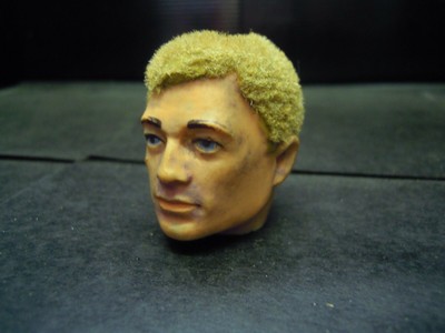 blonde action man