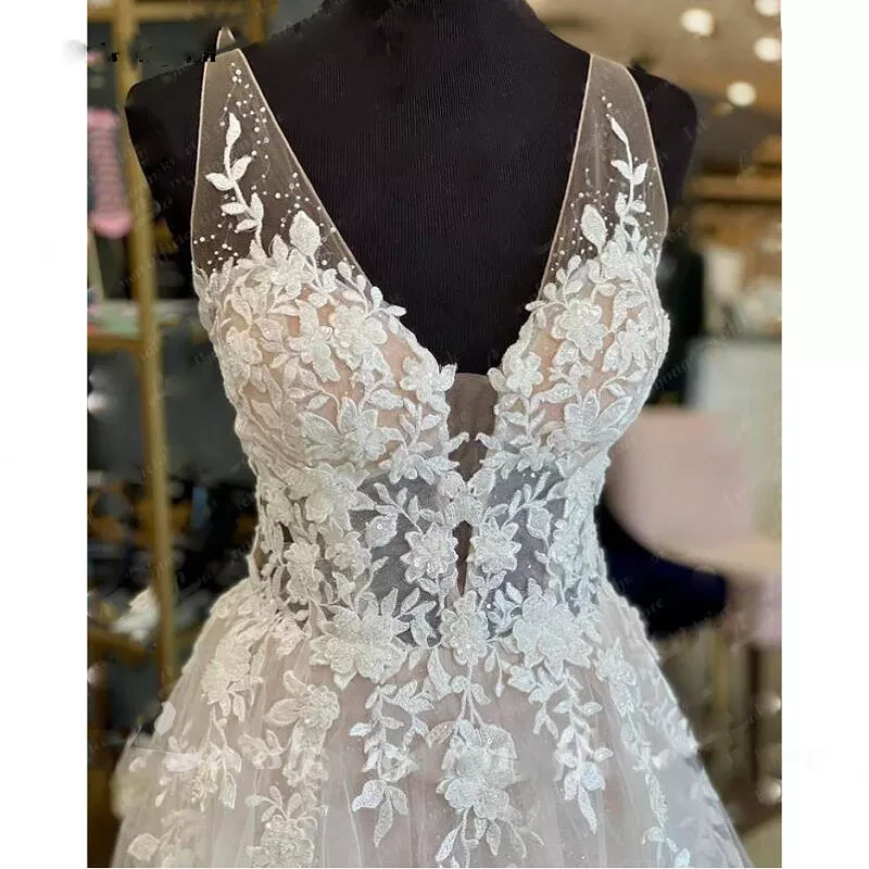 Vestido de novia sin espalda cuello en V boho apliques de encaje línea A vestidos de novia sin mangas Foto 4 de 4