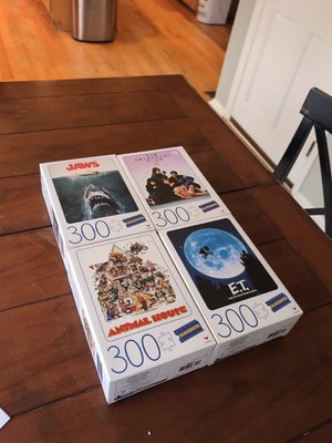 LOT OF 4 BLOCKBUSTER PUZZLES 300 PIECES JAWS E.T. BREAKFAST CLUB ANIMAL HOUSE 