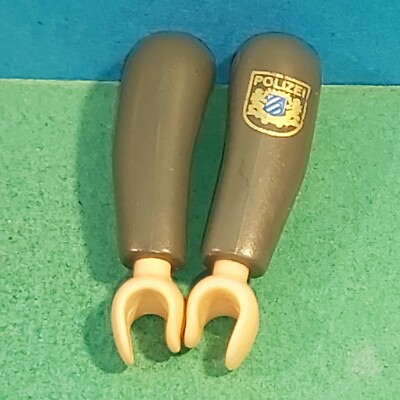 Pièce détacher de personnage bras droit gris playmobil (par 60) ref 1