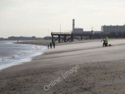 Photo 6x4 Great Yarmouth: fishing on a windy day An angler, wrapped up wa c2011
