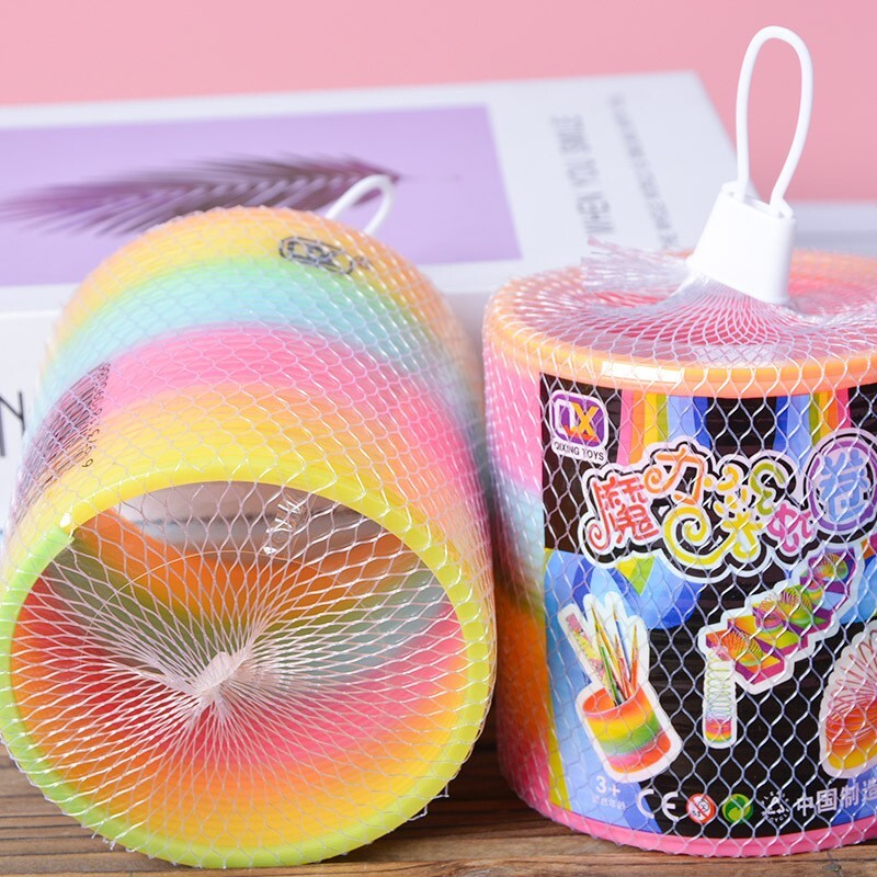 new 2pack Magic Rainbow Color Walking Spring Toy 3.4
