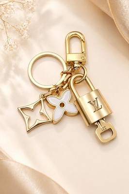 Authentic Louis Vuitton Gold Lock   Unbranded Clover Keychain Bag Charm LV