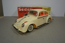 Vintage Volkswagen Beetle Friction Toy Car, China.