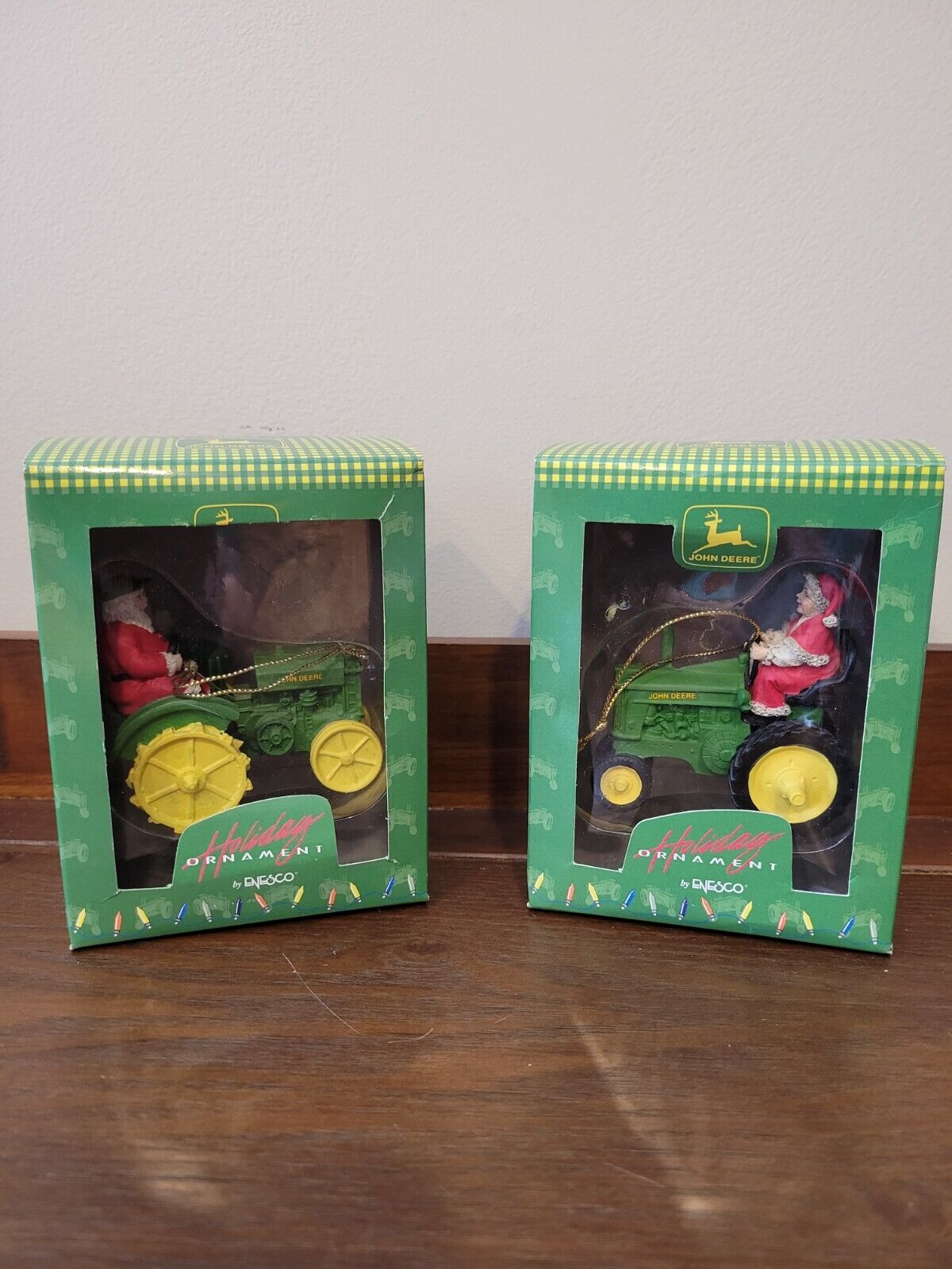John Deere, by Enesco, Holiday Ornaments.   Santa and Mrs. Claus on a tractor.
