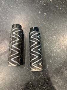 Lightly used universal Black and silver Mongoose BMX  Pegs