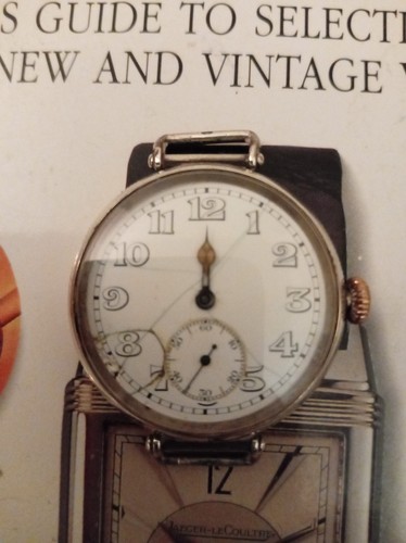 Vintage sterling silver military longines IWW. Early movement screwback/front af