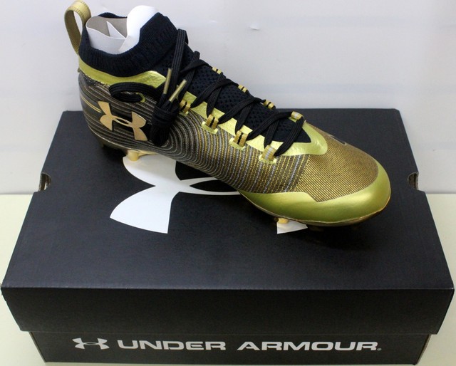gold under armour football cleats
