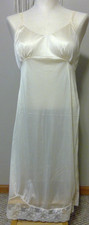Vintage Deena ladies beige colored nylon slip w/ lace trim size 36 1960's 