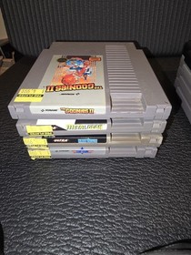 Nintendo NES with Game Genie and Games