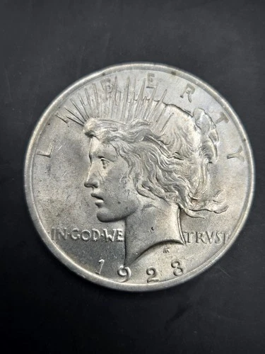 1923 Peace dollar, BU tremendous luster, 90% Silver