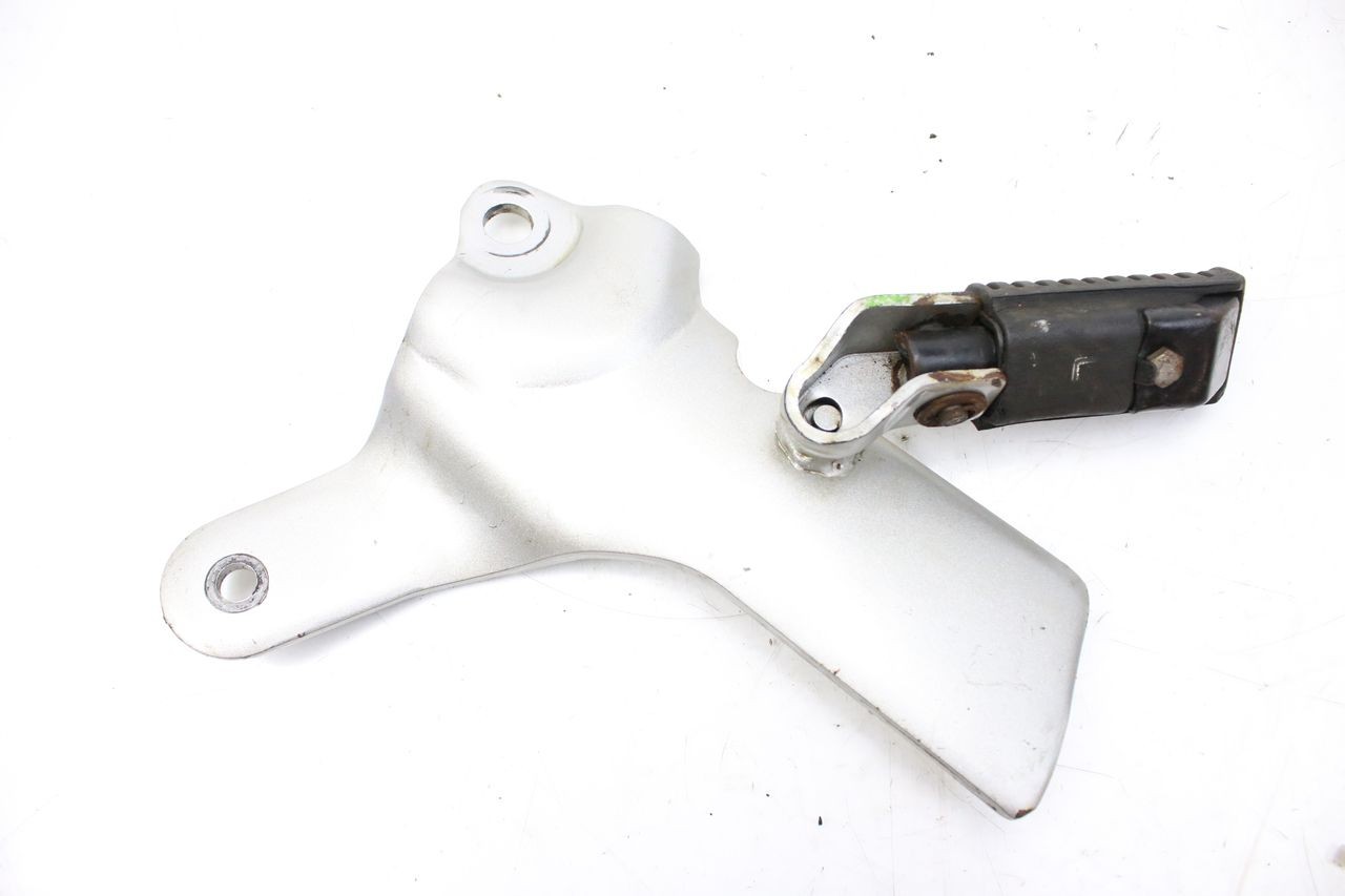 LEFT REAR FOOTREST MOUNTING PLATE - SYM HUSKY 125 (1999 - 2005)