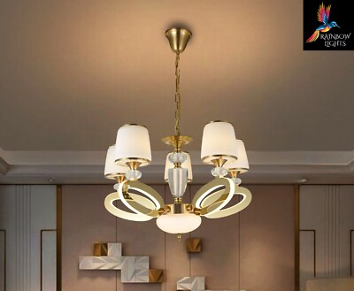 Minimalist-style ceiling chandelier featuring 5 upward-facing lamp.