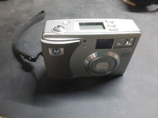HP Photosmart 735 GRLYB-0210 Silver 3.2 Mega Pixels Digital Camera with 15x Zoom