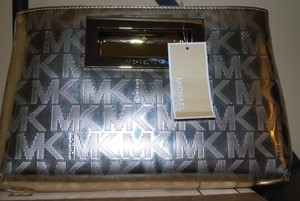 mk gold clutch