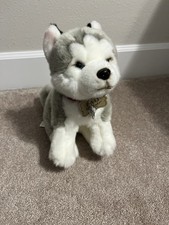 FAO Schwartz husky plush stuffed animal.