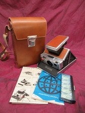 Vintage Polaroid SX-70 Land Camera leather  stainless with booklets, case CLEAN
