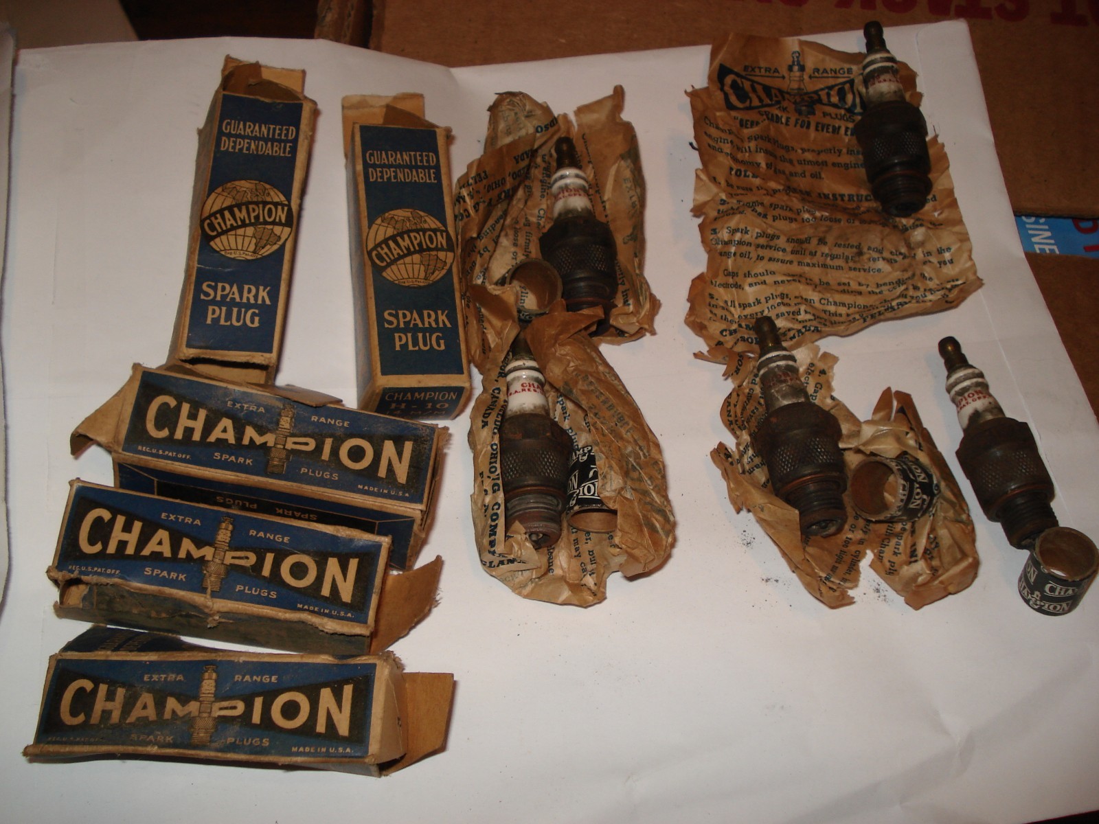 LOT 5 Champion H-10 Spark Plugs Used With Boxes Some Wraps Sleeves